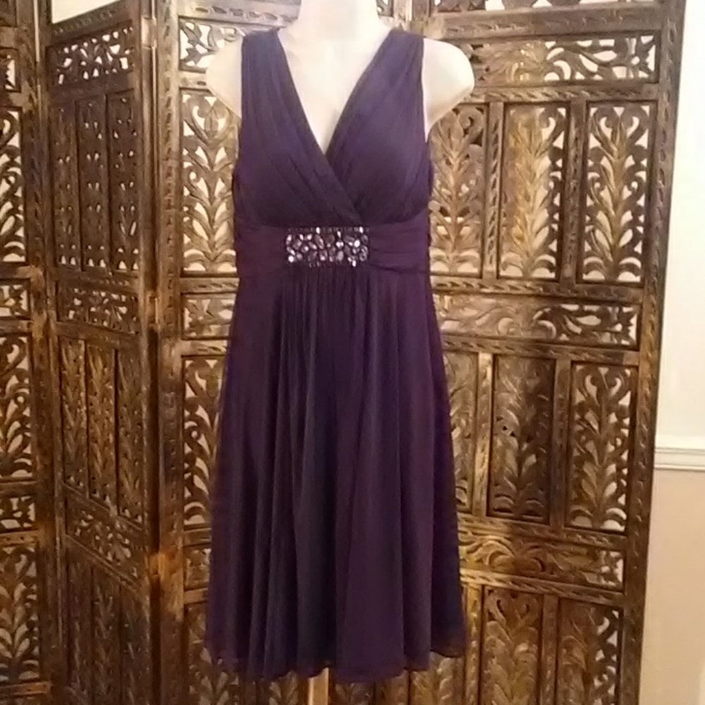 Dark purple w/ a middle rhinestone dress, size 10p